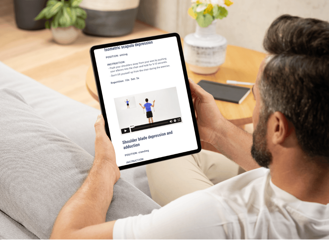 Patient viewing home exercise program on tablet